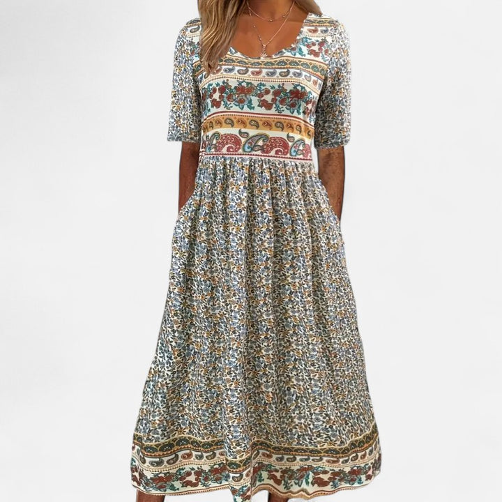 Ariste | Robe longue fleurie fluide avec poches pour femme