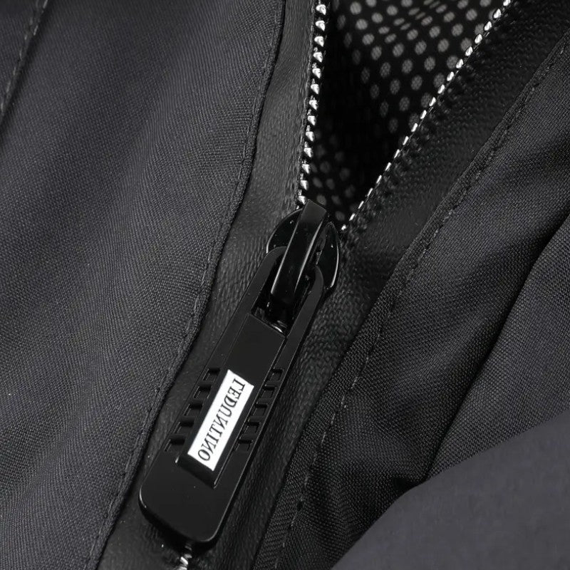 Ariste | Veste coupe-vent multi-poches pour homme