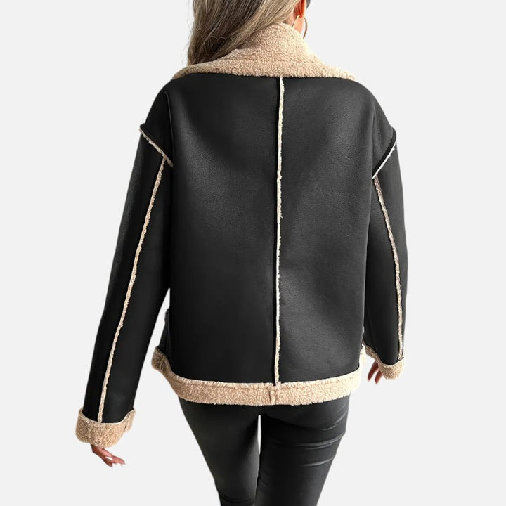 Ariste | Veste biker élégante doublée de fausse fourrure pour femme