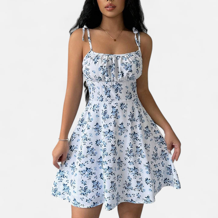 Ariste | Robe courte à bretelles fines et fleurs pour femme