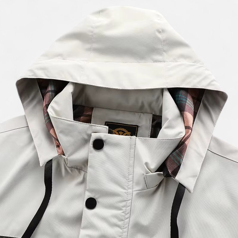 Ariste | Coupe-vent Softshell à capuche pour homme